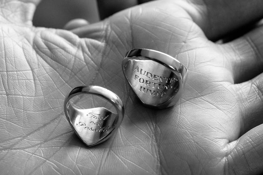 Rings by Kim Dunham with words on the inside of the bands