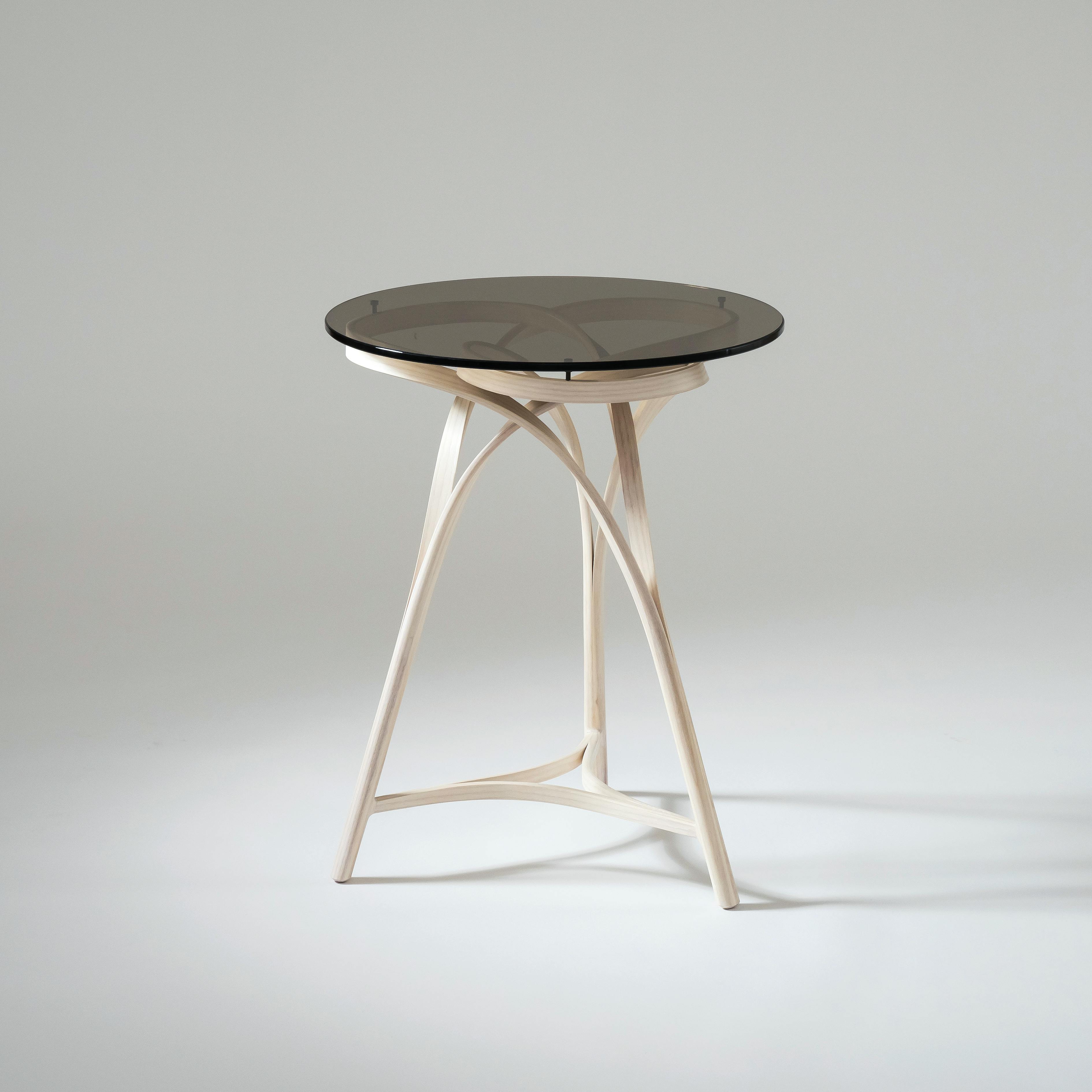 bent wood side table with glass top by Yuri Kobayashi