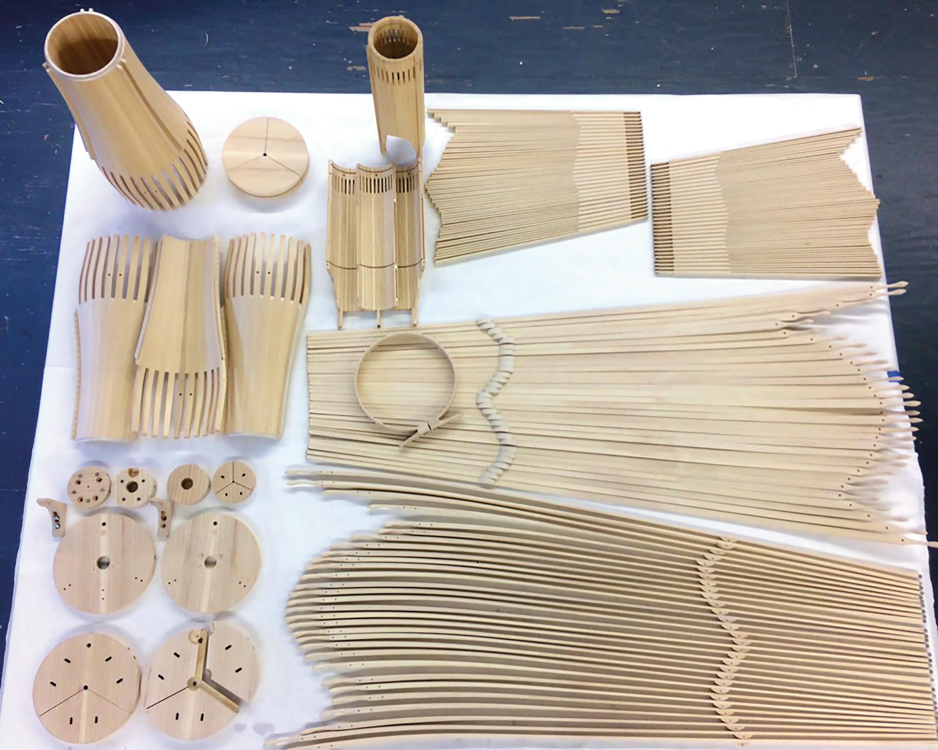 various wooden components for a hanging sculpture