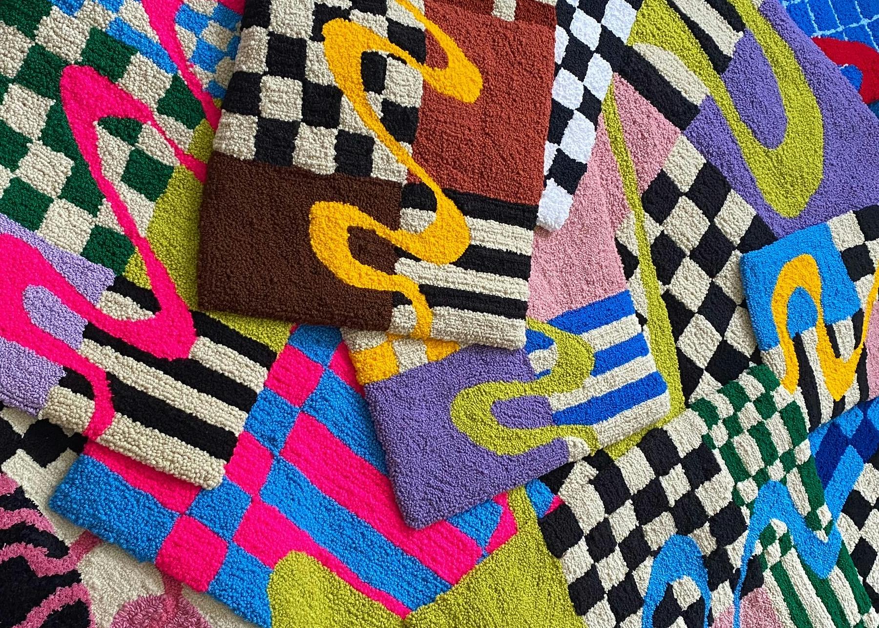 assorted colorful hand tufted rugs