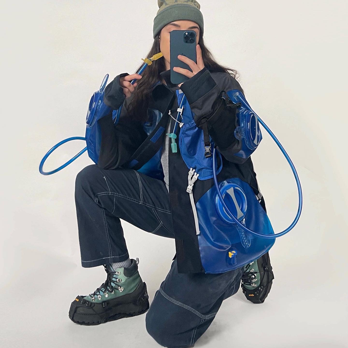 model wearing a jack made from CamelBak water reservoirs