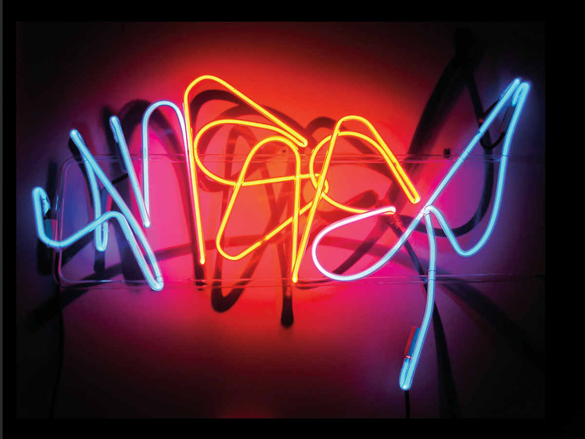 blue and orange neon sign showing the stylized word ANSER