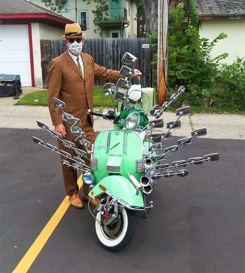Portrait of Kent Aldrich with moped