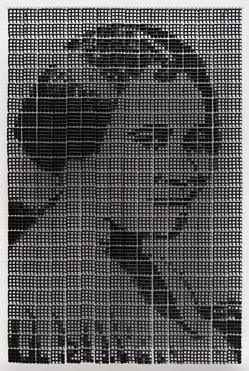 Portrait of Madam CJ Walker made from black combs