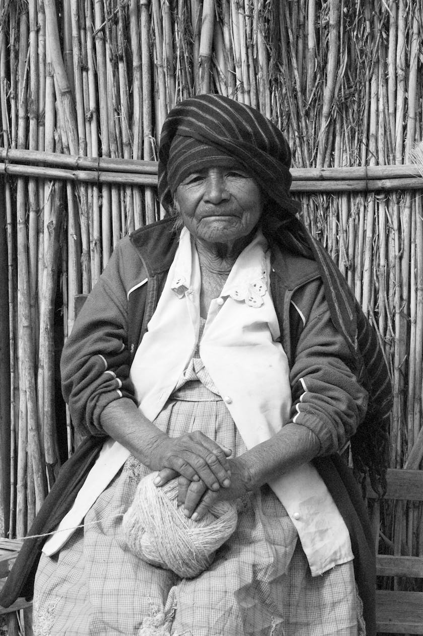 black and white portrait of an oaxacan wool spinner