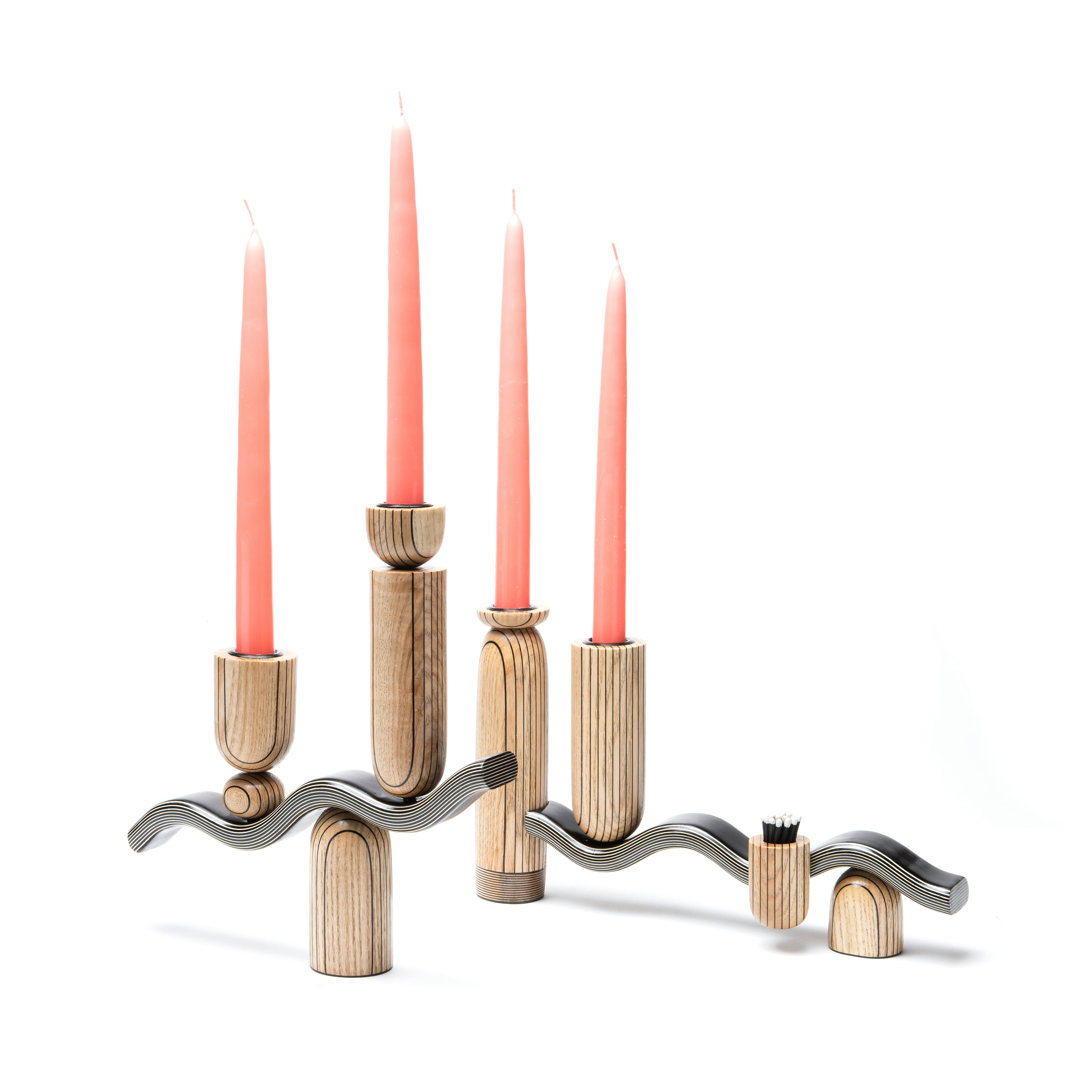 handmade wooden candelabra with pink candles