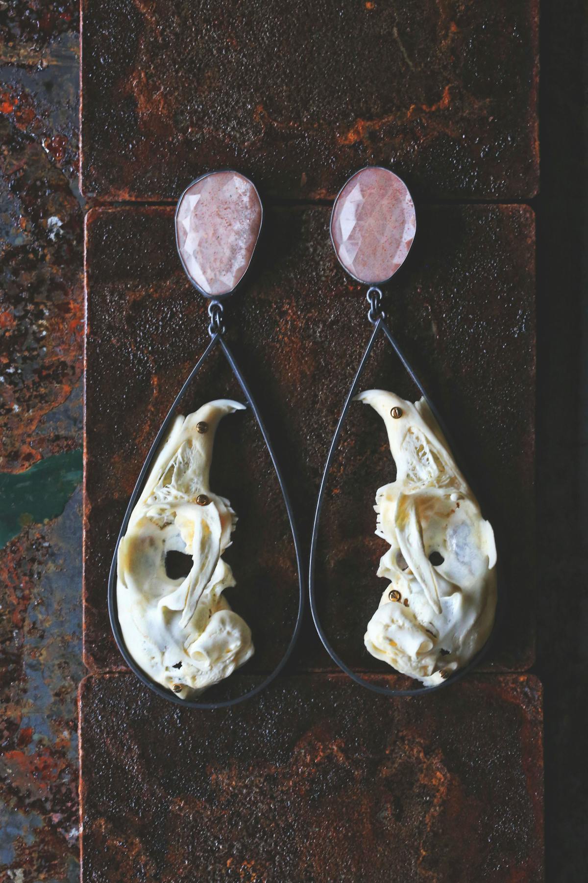 hoop earrings with rabbit skulls and gemstones