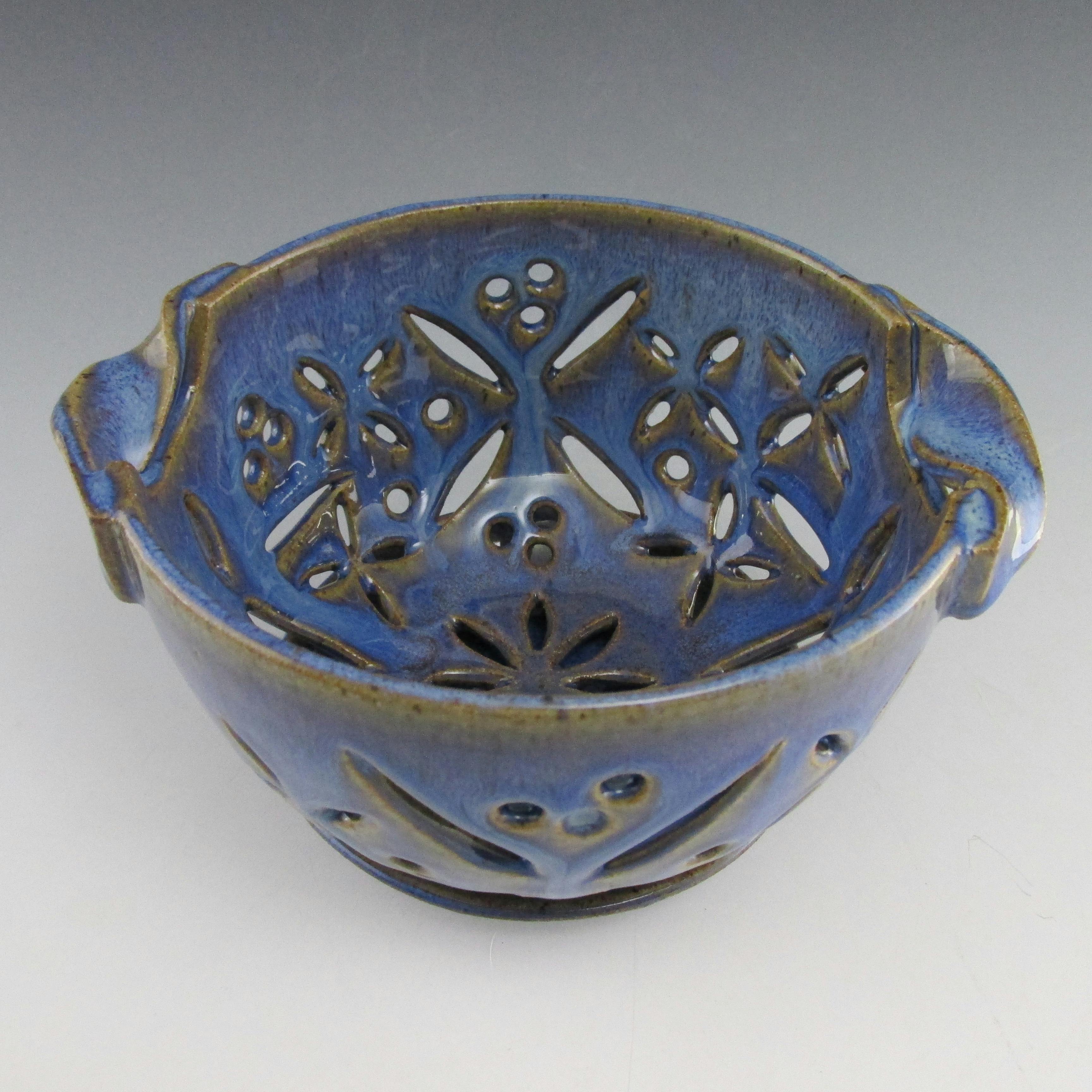 blue ceramic collander bowl