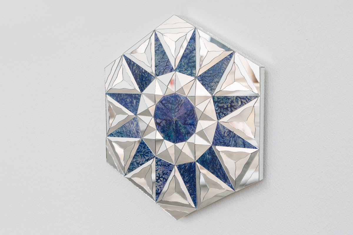 geometric reflective hexagonal wall art