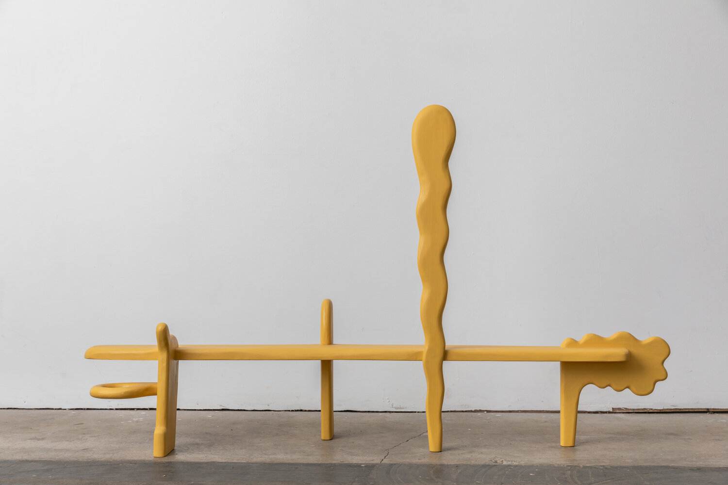 Yellow bench with comic strip-inspired shapes