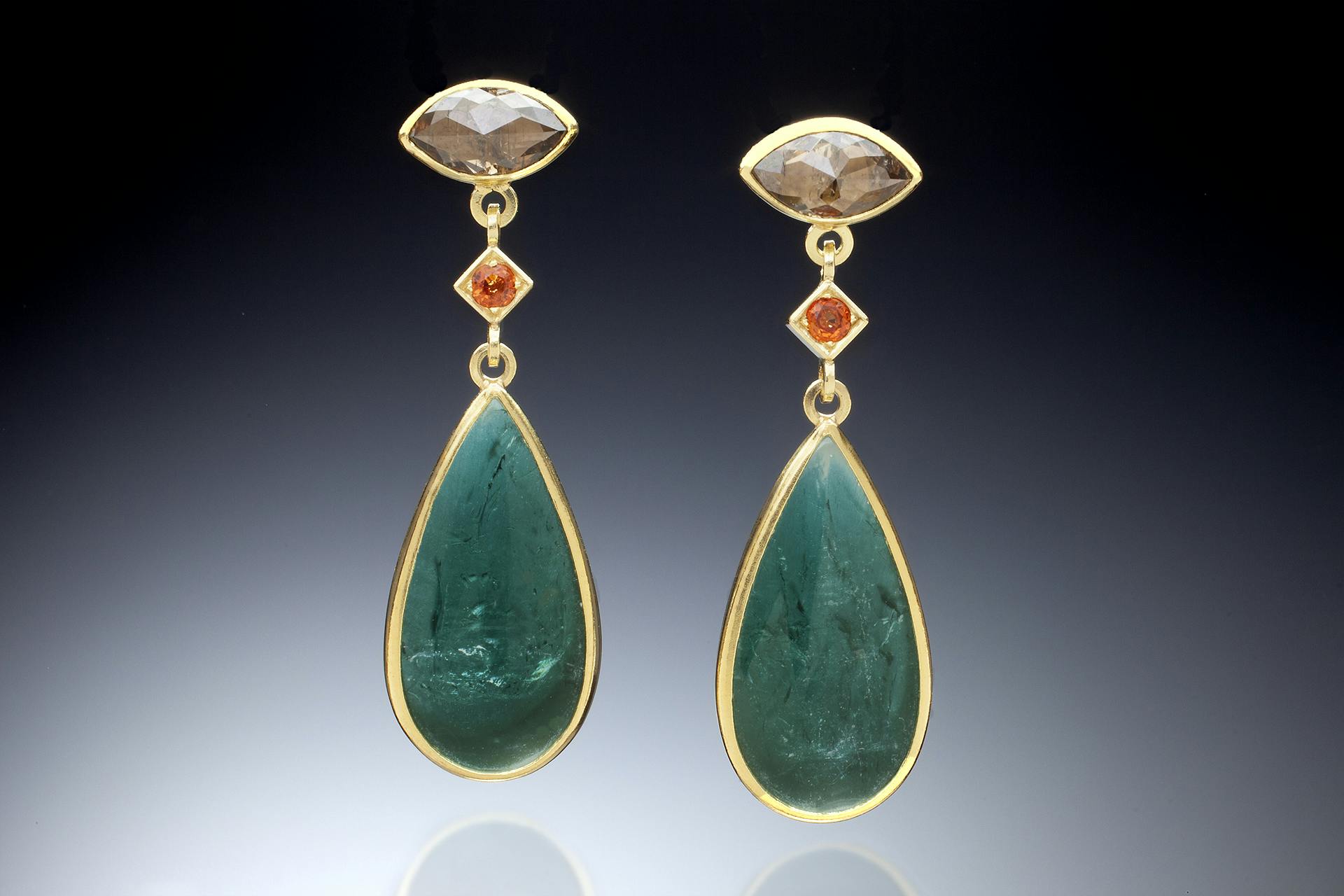 pair of handcrafted pendant earrings