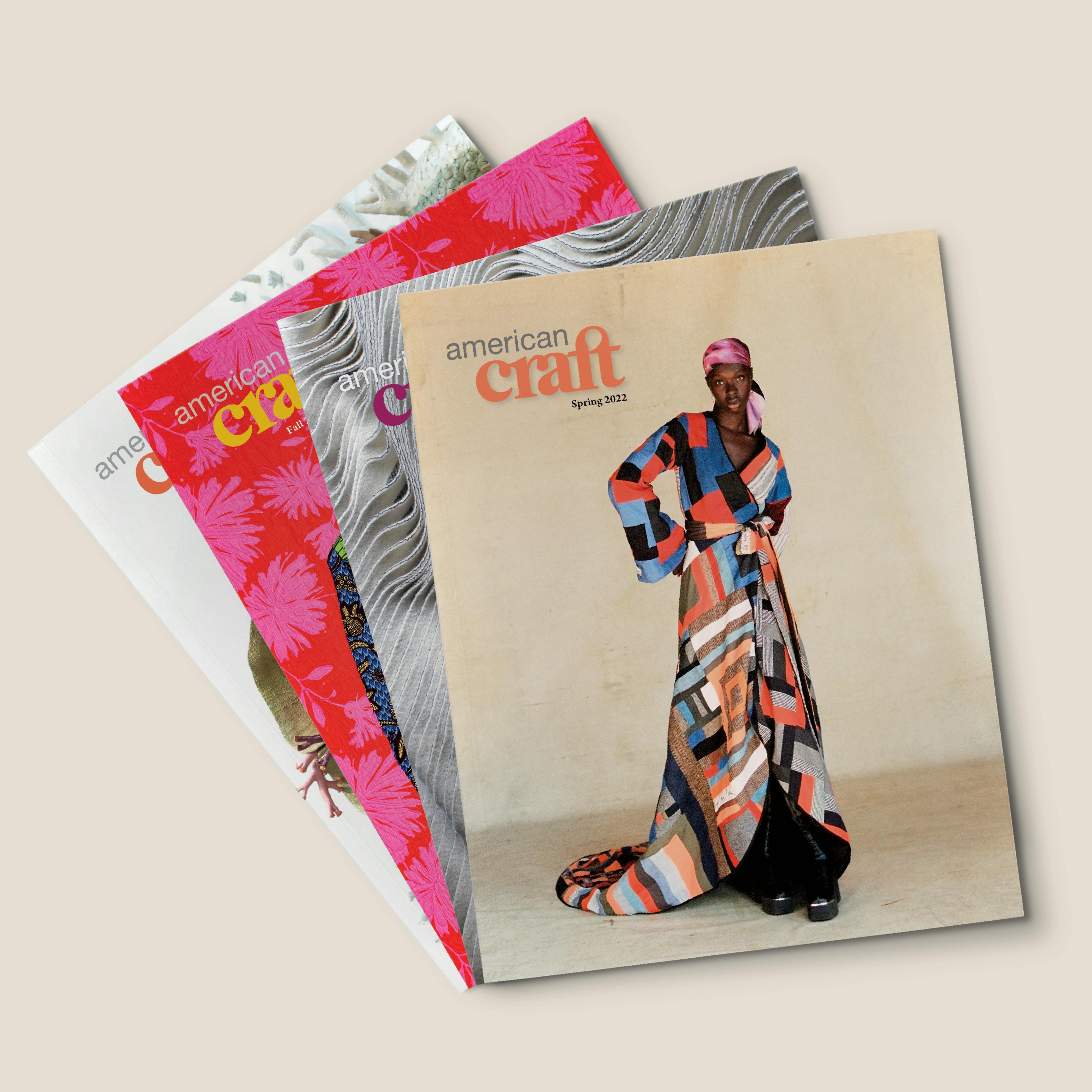 stack of four issues of american craft with the spring 2022 issue on top
