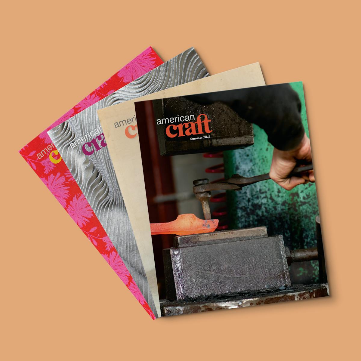 stack of four issues of american craft with the spring 2022 issue on top